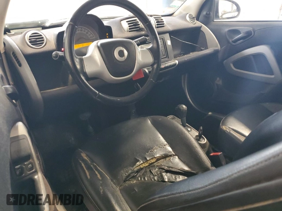 2013 Smart fortwo Pure с VIN WMEEJ3BA9DK626037, выставлен на аукционе Copart как лот 54573255 с пробегом 66 070 миль миль и Чистый • Clean title. История ставок и продаж доступна на DreamBid. Изображение 8.