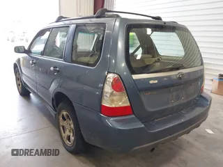 2007 Subaru Forester X with VIN JF1SG63697H705954, listed as a IAAI auction lot 41969618 with 263,165 mi miles. Bid and sale history available at carsss.com. Image 3.