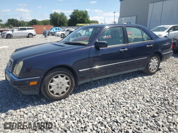 1998 Mercedes-Benz E with VIN WDBJF82F4WX012153, listed as a Copart auction lot 51848665 with 121,867 mi miles and Salvage Title. Bid and sale history available at DreamBid. Image 1.