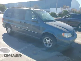 2002 Kia Sedona LX with VIN KNDUP131826297204, listed as a IAAI auction lot 41510393 with 136,337 mi miles. Bid and sale history available at carsss.com. Image 1.