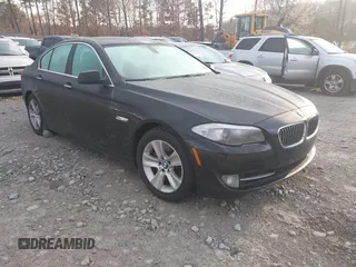 2012 BMW 5 Series 528i with VIN WBAXG5C52CDX05794, listed as a IAAI auction lot 41796084 with 104,022 mi miles. Bid and sale history available at carsss.com. Image 1.