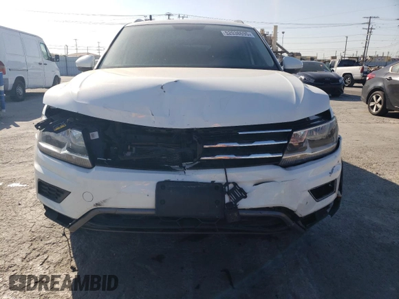 2020 Volkswagen Tiguan SE z VIN 3VV3B7AX6LM107732, wystawiony jako Copart lot #52038695 z przebiegiem 27 317 mil mil oraz Szkoda całkowita • Salvage title. Historia ofert i sprzedaży dostępna na DreamBid. Obrazek 5.