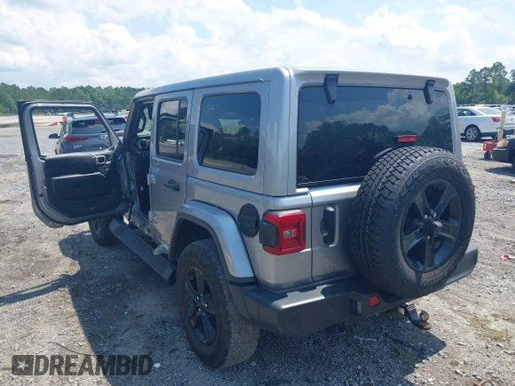 2021 Jeep Wrangler Unlimited Sahara with VIN 1C4HJXEN3MW628845, listed as a IAAI auction lot 42438049 with 49,970 mi miles and . Bid and sale history available at DreamBid. Image 3.