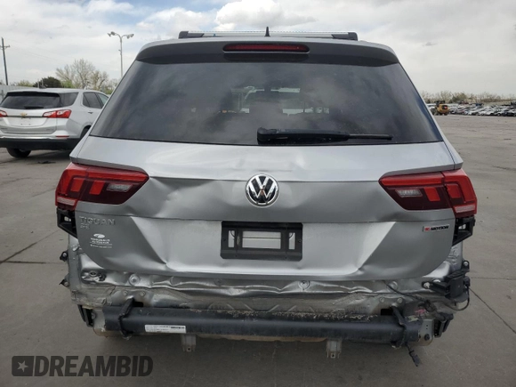 2021 Volkswagen Tiguan SE z VIN 3VV2B7AX3MM150311, wystawiony jako Copart lot #50970015 z przebiegiem 41 156 mil mil oraz Szkoda całkowita • Salvage title. Historia ofert i sprzedaży dostępna na DreamBid. Obrazek 6.
