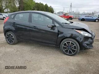 2019 Ford Fiesta SE z VIN 3FADP4EJ8KM124903, wystawiony jako Copart lot #54560125 z przebiegiem 86 616 mil mil oraz Szkoda całkowita • Salvage title. Historia ofert i sprzedaży dostępna na DreamBid. Obrazek 4.