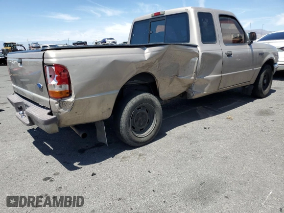 1997 Ford Ranger XL with VIN 1FTCR14A2VPB40920, listed as a Copart auction lot 57128065 with 179,876 mi miles and Salvage title. Bid and sale history available at DreamBid. Image 3.
