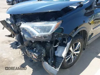 2018 Toyota RAV4 XLE with VIN 2T3WFREV2JW447623, listed as a IAAI auction lot 42410168 with 84,800 mi miles and . Bid and sale history available at DreamBid. Image 17.