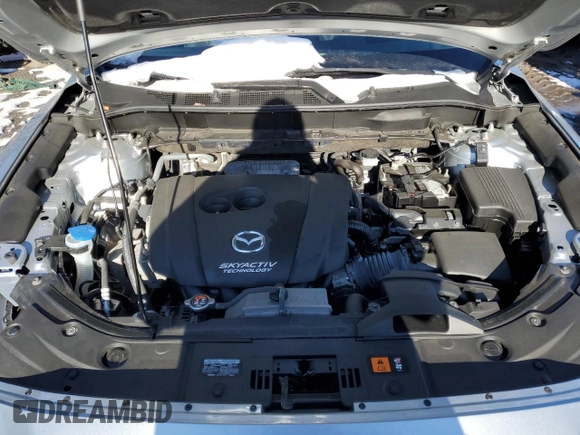 2017 Mazda CX-5 Grand Touring with VIN JM3KFBDL0H0210365, listed as a Copart auction lot 89096995 with 52,549 mi miles and Salvage Title. Bid and sale history available at carsss.com. Image 12.