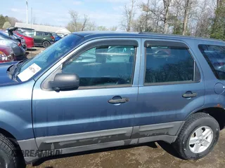 2006 Ford Escape XLS with VIN 1FMYU02Z06KA68584, listed as a IAAI auction lot 41887104 with 257,855 mi miles and . Bid and sale history available at DreamBid. Image 14.