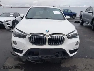 2018 BMW X1 sDrive28i with VIN WBXHU7C32J5H44246, listed as a IAAI auction lot 41477050 with 69,858 mi miles. Bid and sale history available at carsss.com. Image 12.