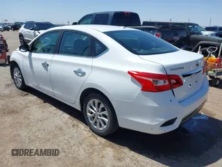 2019 Nissan Sentra S z VIN 3N1AB7AP5KY285776, wystawiony jako IAAI lot #41969976 z przebiegiem 87 187 mil mil oraz . Historia ofert i sprzedaży dostępna na DreamBid. Obrazek 3.