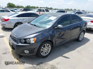 2012 Chevrolet Sonic LT with VIN 1G1JC5SH1C4182616, listed as a IAAI auction lot 42081899 with 92,802 mi miles and . Bid and sale history available at DreamBid. Image 2.