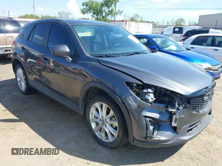 2014 Mazda CX-5 Grand Touring with VIN JM3KE2DY8E0383206, listed as a IAAI auction lot 40205756 with 120,231 mi miles. Bid and sale history available at carsss.com. Image 1.