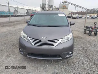 2015 Toyota Sienna Limited z VIN 5TDDK3DC6FS128167, wystawiony jako IAAI lot #41699588 z przebiegiem 179 723 mil mil oraz . Historia ofert i sprzedaży dostępna na DreamBid. Obrazek 12.