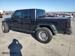 2023 Jeep Gladiator Overland with VIN 1C6HJTFG2PL559314, listed as a Copart auction lot 87530945 with 9,434 mi miles and Salvage Title. Bid and sale history available at carsss.com. Image 2.