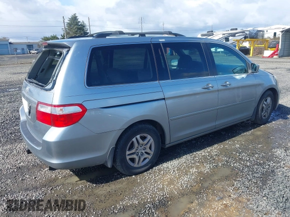 2007 Honda Odyssey EX with VIN 5FNRL38457B141956, listed as a IAAI auction lot 41818619 with 160,649 mi miles. Bid and sale history available at carsss.com. Image 4.