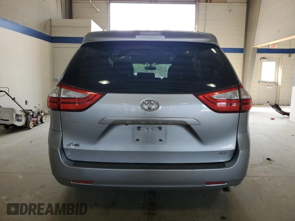 2015 Toyota Sienna XLE with VIN 5TDYK3DC9FS589378, listed as a Copart auction lot 54219075 with 117,766 mi miles and Salvage Title. Bid and sale history available at DreamBid. Image 6.
