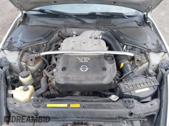 2005 Nissan 350Z Touring with VIN JN1AZ34E85M652465, listed as a IAAI auction lot 41418161 with 153,099 mi miles. Bid and sale history available at carsss.com. Image 10.