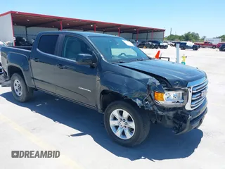 2018 GMC Canyon 2WD SLE with VIN 1GTG5CEN2J1110162, listed as a IAAI auction lot 42525800 with 130,397 mi miles and . Bid and sale history available at DreamBid. Image 1.
