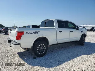 2017 Nissan Titan XD PRO-4X with VIN 1N6BA1F43HN562492, listed as a Copart auction lot 72621804 with 140,562 mi miles and Salvage Title. Bid and sale history available at carsss.com. Image 3.