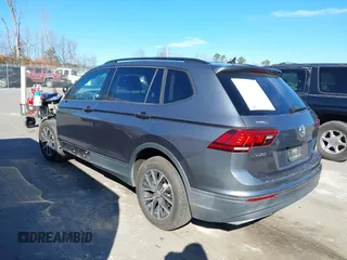 2021 Volkswagen Tiguan S with VIN 3VV1B7AX1MM044788, listed as a IAAI auction lot 41678069 with 91,665 mi miles and . Bid and sale history available at DreamBid. Image 3.