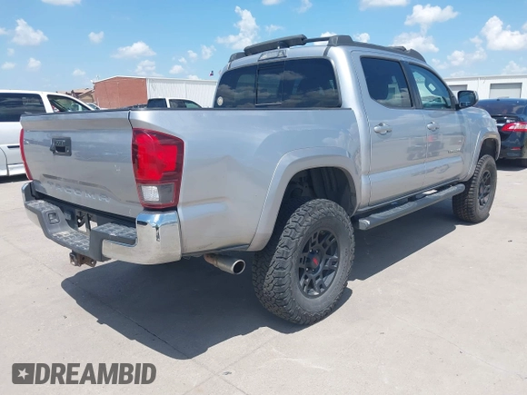 2018 Toyota Tacoma SR with VIN 3TMCZ5AN2JM172829, listed as a IAAI auction lot 42073847 with 136,671 mi miles and . Bid and sale history available at carsss.com. Image 4.
