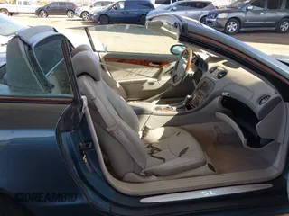 2005 Mercedes-Benz SL 500 with VIN WDBSK75F95F106944, listed as a IAAI auction lot 41970698 with 123,881 mi miles and . Bid and sale history available at DreamBid. Image 8.