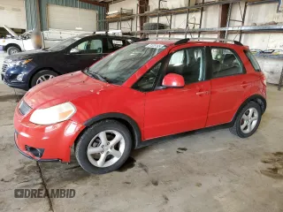 2009 Suzuki SX4 Touring AWD z VIN JS2YB417X95102038, wystawiony jako Copart lot #51526195 z przebiegiem 133 582 mil mil oraz Szkoda całkowita • Salvage title. Historia ofert i sprzedaży dostępna na DreamBid. Obrazek 1.