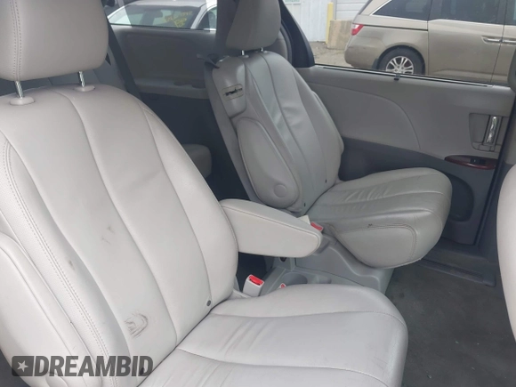 2013 Toyota Sienna XLE AAS with VIN 5TDYK3DCXDS302949, listed as a IAAI auction lot 42611370 with 236,663 mi miles and . Bid and sale history available at DreamBid. Image 8.