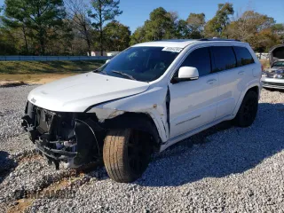 2015 Jeep Grand Cherokee Summit with VIN 1C4RJEJG6FC759594, listed as a Copart auction lot 86864204 with 164,120 mi miles and Salvage title. Bid and sale history available at DreamBid. Image 1.