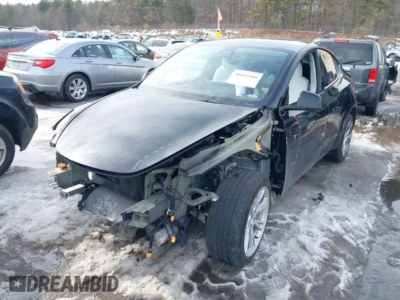 2023 Tesla Model Y Long Range z VIN 7SAYGDEE8PF826989, wystawiony jako IAAI lot #41615166 z przebiegiem 10 368 mil mil oraz . Historia ofert i sprzedaży dostępna na DreamBid. Obrazek 20.