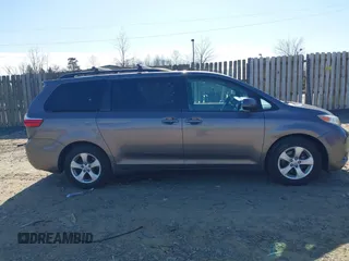 2016 Toyota Sienna LE AAS with VIN 5TDKK3DC3GS765784, listed as a IAAI auction lot 41759100 with 119,218 mi miles. Bid and sale history available at carsss.com. Image 13.