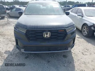 2025 Honda Pilot TrailSport with VIN 5FNYG1H61SB026477, listed as a IAAI auction lot 41471719 with 12,624 mi miles and . Bid and sale history available at DreamBid. Image 12.