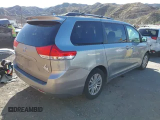 2011 Toyota Sienna XLE AAS with VIN 5TDYK3DC2BS153417, listed as a IAAI auction lot 41685324 with 158,195 mi miles. Bid and sale history available at carsss.com. Image 4.