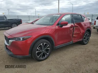 2023 Mazda CX-5 2.5 S Premium Package with VIN JM3KFBDMXP0135651, listed as a Copart auction lot 50531605 with 36,656 mi miles and Salvage Title. Bid and sale history available at carsss.com. Image 1.
