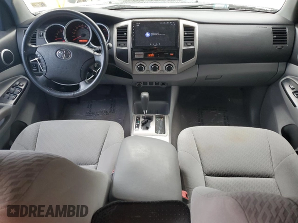 2010 Toyota Tacoma PreRunner with VIN 3TMJU4GN3AM097601, listed as a Copart auction lot 57703415 with 227,978 mi miles and Salvage title. Bid and sale history available at DreamBid. Image 8.