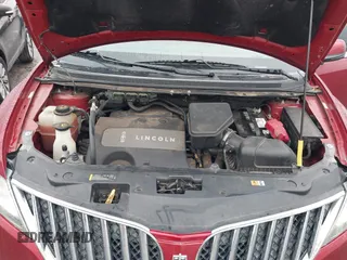 2014 Lincoln MKX with VIN 2LMDJ6JK3EBL09582, listed as a IAAI auction lot 41520611 with 157,022 mi miles. Bid and sale history available at carsss.com. Image 10.