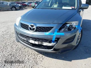 2012 Mazda CX-9 Touring z VIN JM3TB3CV7C0361690, wystawiony jako IAAI lot #41804539 z przebiegiem 133 861 mil mil oraz . Historia ofert i sprzedaży dostępna na DreamBid. Obrazek 6.