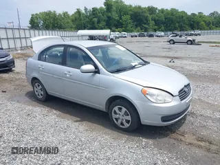 2011 Hyundai Accent GLS z VIN KMHCN4AC9BU613272, wystawiony jako IAAI lot #42320248 z przebiegiem 199 541 mil mil oraz . Historia ofert i sprzedaży dostępna na DreamBid. Obrazek 1.