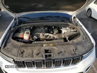 2023 Jeep Grand Cherokee Overland with VIN 1C4RJHDG8PC502208, listed as a Copart auction lot 86927734 with 53,732 mi miles and Salvage title. Bid and sale history available at DreamBid. Image 12.