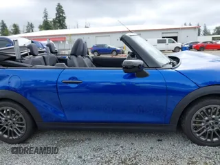 2025 MINI Convertible with VIN WMW23GX01S2X08664, listed as a IAAI auction lot 42506008 with 1,641 mi miles and . Bid and sale history available at DreamBid. Image 14.