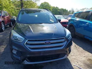 2017 Ford Escape SE z VIN 1FMCU0GDXHUB66813, wystawiony jako IAAI lot #42056150 z przebiegiem 86 915 mil mil oraz . Historia ofert i sprzedaży dostępna na DreamBid. Obrazek 12.