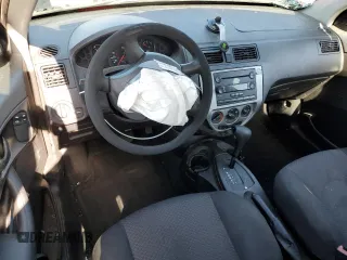 2007 Ford Focus S with VIN 1FAHP31N27W286022, listed as a Copart auction lot 56997445 with 112,157 mi miles and Salvage title. Bid and sale history available at DreamBid. Image 8.
