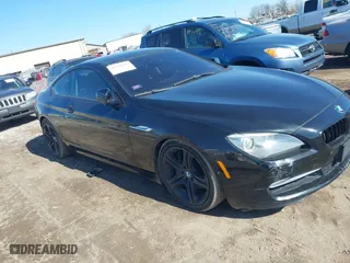 2012 BMW 6 Series 650i xDrive with VIN WBALX5C59CC894030, listed as a IAAI auction lot 41763126 with 115,562 mi miles. Bid and sale history available at carsss.com. Image 1.