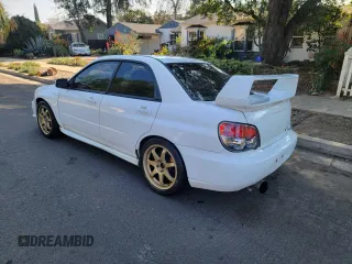 2004 Subaru Impreza Sedan (Natl) WRX STi w/Gold Wheels with VIN JF1GD70634L521191, listed as a Copart auction lot 42081255 with 181,354 mi miles and Salvage Title. Bid and sale history available at carsss.com. Image 3.