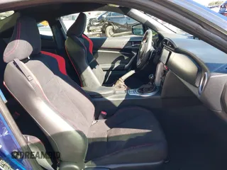 2013 Scion FR-S with VIN JF1ZNAA11D2702415, listed as a IAAI auction lot 40381041 with 63,581 mi miles. Bid and sale history available at carsss.com. Image 5.