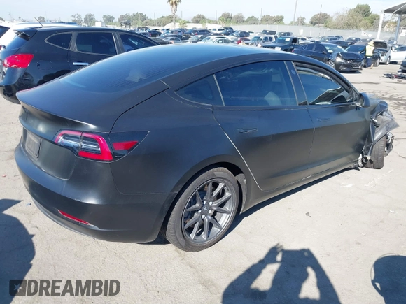 2019 Tesla Model 3 Mid Range with VIN 5YJ3E1EA0KF509547, listed as a IAAI auction lot 40720566 with 41,655 mi miles and . Bid and sale history available at DreamBid. Image 4.