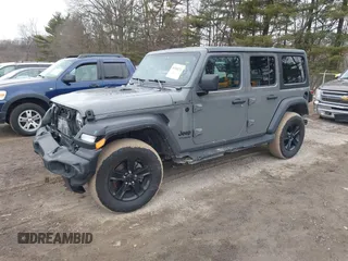 2021 Jeep Wrangler Unlimited Sport Altitude with VIN 1C4HJXDG1MW603784, listed as a IAAI auction lot 41509231 with 102,567 mi miles and . Bid and sale history available at DreamBid. Image 2.