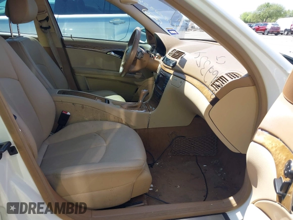 2009 Mercedes-Benz E-Class Luxury 3.5L with VIN WDBUF56X19B430167, listed as a IAAI auction lot 41862354 with 170,835 mi miles. Bid and sale history available at carsss.com. Image 5.