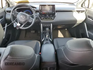 2022 Toyota Corolla Cross XLE с VIN 7MUDAAAG0NV030559, выставлен на аукционе Copart как лот 54075315 с пробегом 28 557 миль миль и Списание • Salvage title. История ставок и продаж доступна на DreamBid. Изображение 8.